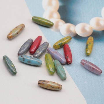 チェコ調ガラスビーズ ロングオーバル チェコガラス風 アンティーク風 カラーランダム 約4×12mm（20ヶ）